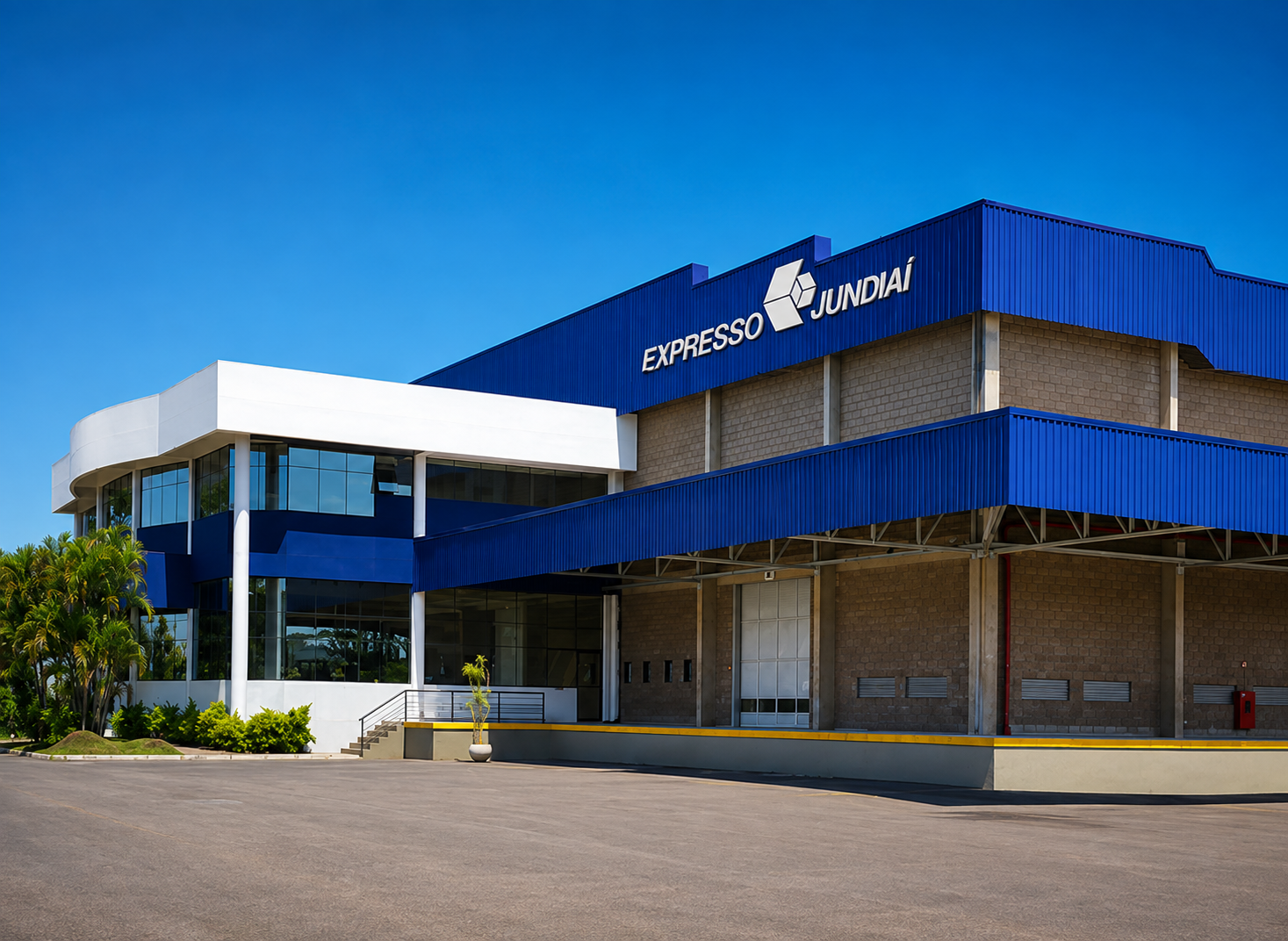 Centro de distribuição do Expresso Jundiaí com fachada azul e letreiro da empresa